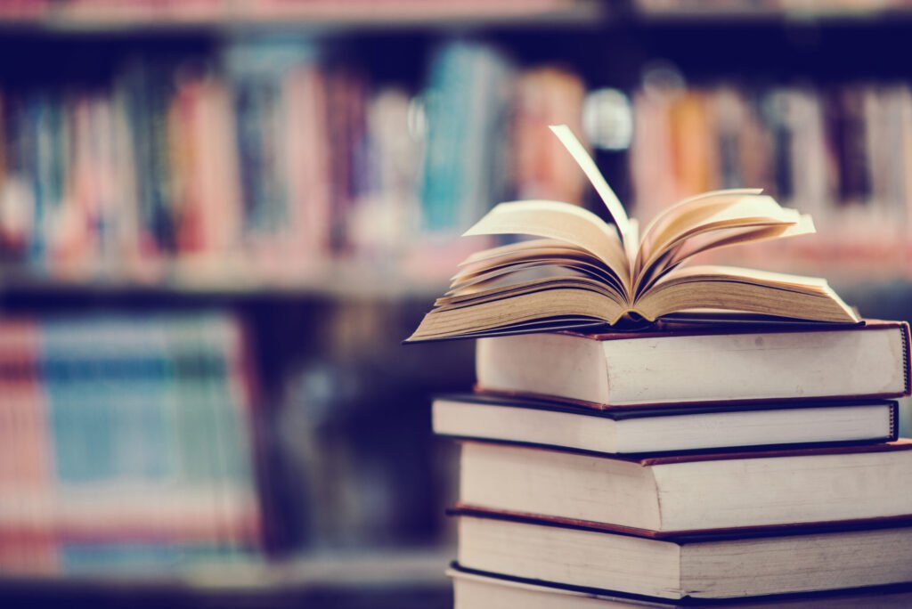 book-library-with-open-textbook-2-scaled.jpg