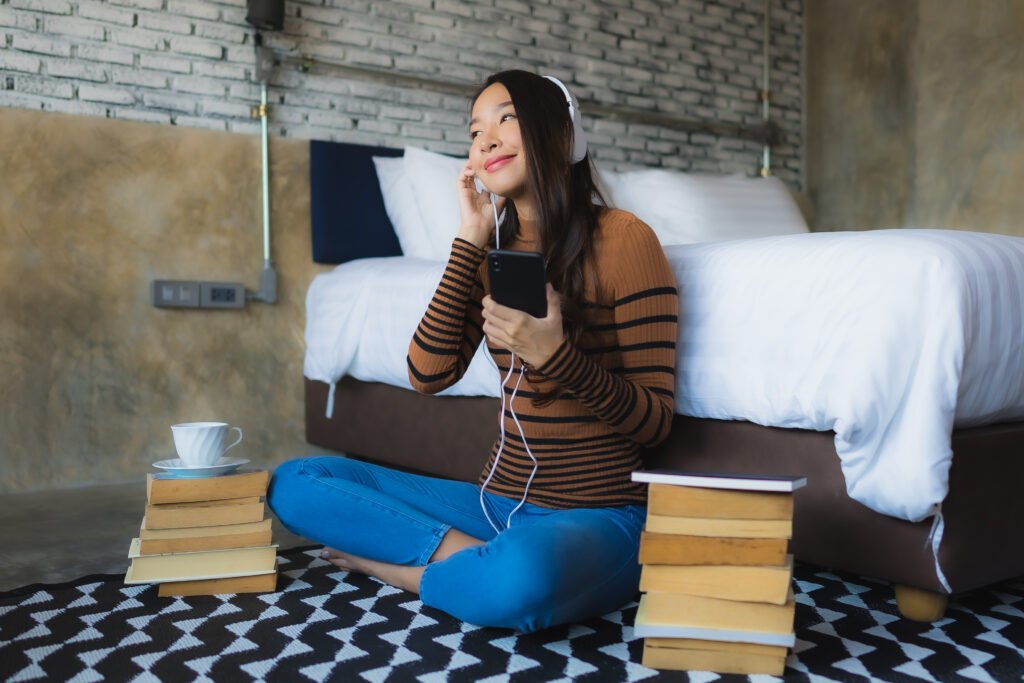 Young asian woman using smart mobile pho